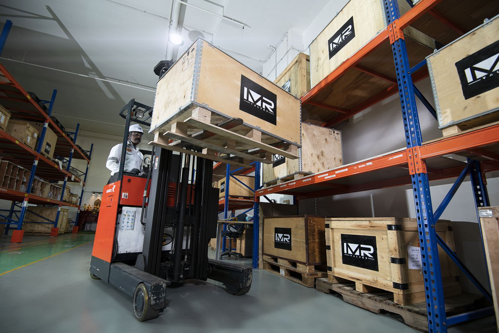 Crated equipment being moved in our workshop