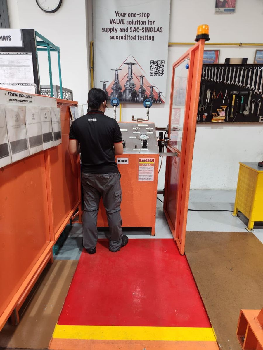Technician at the SAC-SINGLAS accredited valve test bench