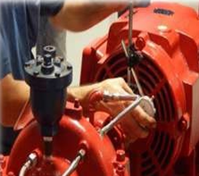 Technician overhauling a centrifugal pump